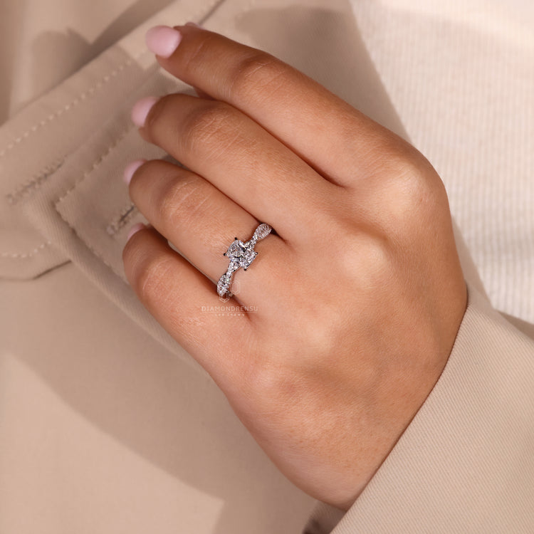 White gold ring with cushion cut center stone