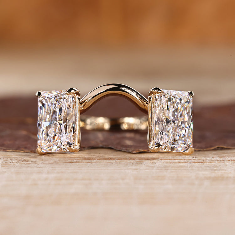Radiant cut lab grown diamond two stone engagement ring.