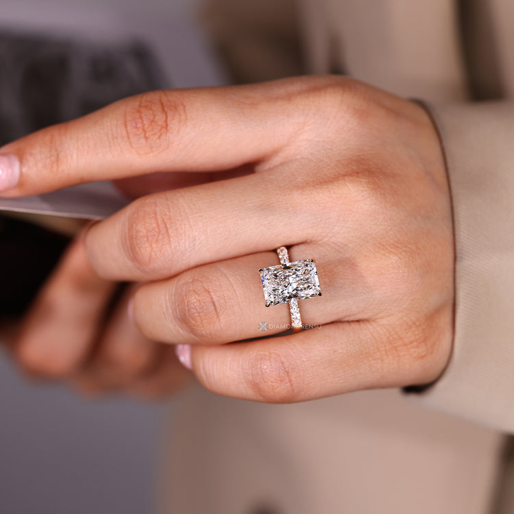 Handmade radiant diamond ring with tapered shank.
