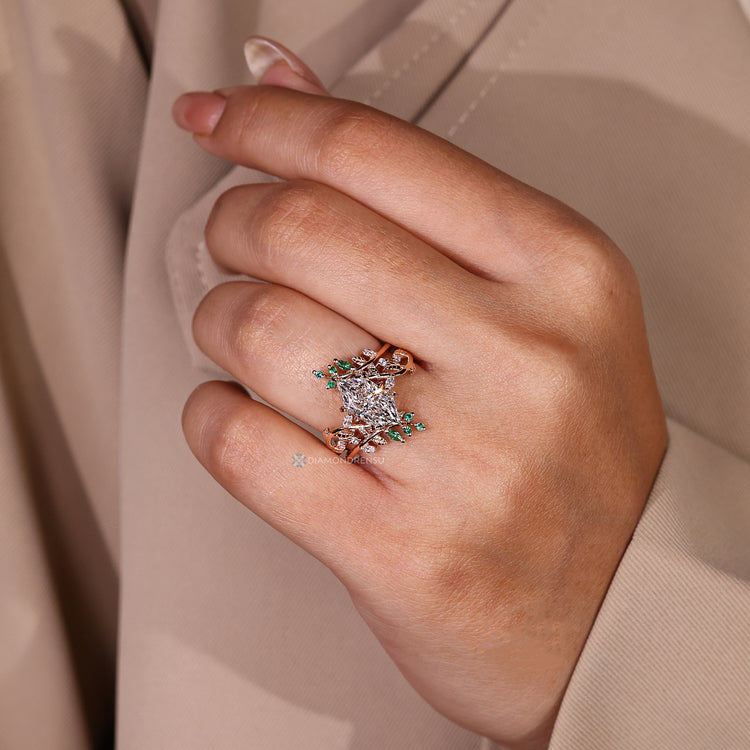Marquise and round diamond ring with enhancer band.