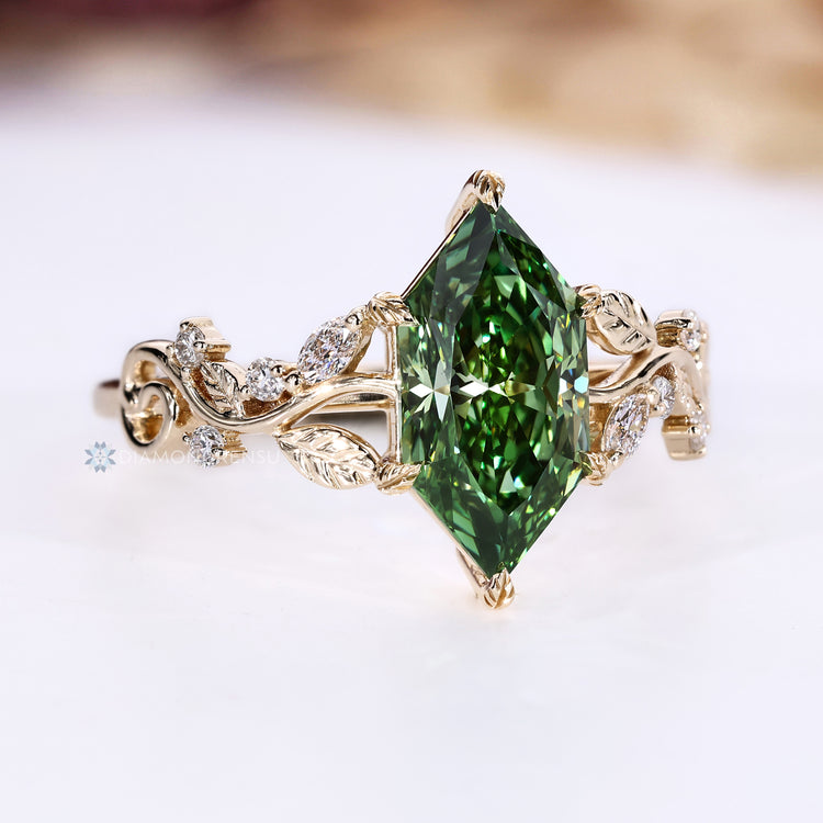 Dutch Marquise diamond ring with six leaf prong setting.
