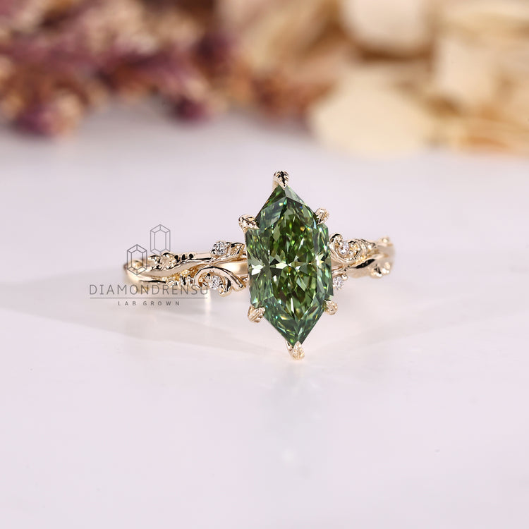Handmade Dutch marquise diamond ring with round side accents.
