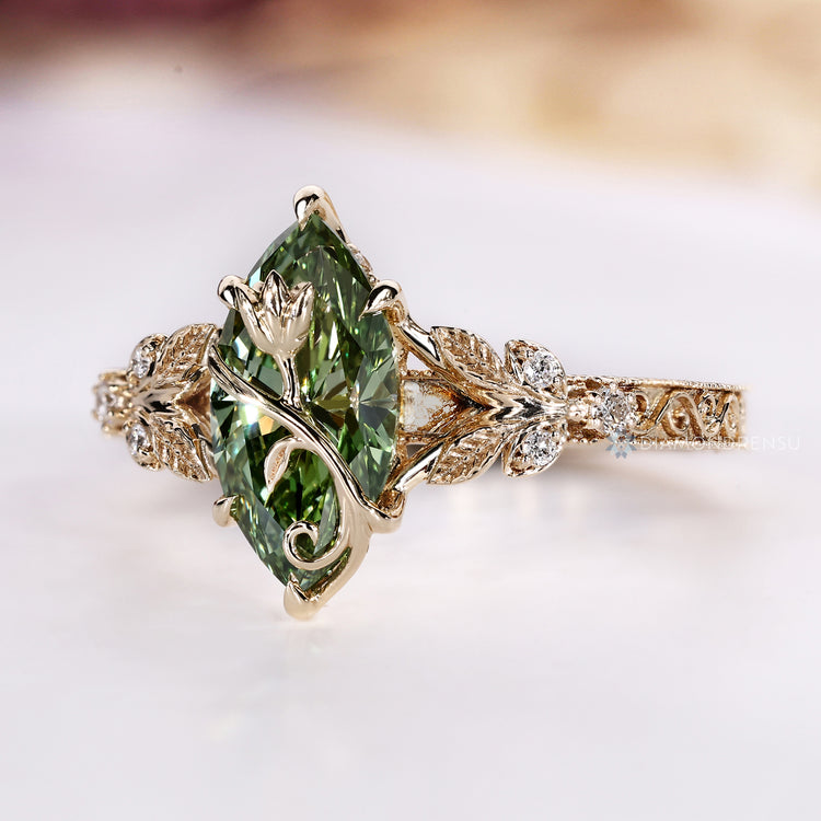 Handmade marquise cut ring with five claw prong setting.