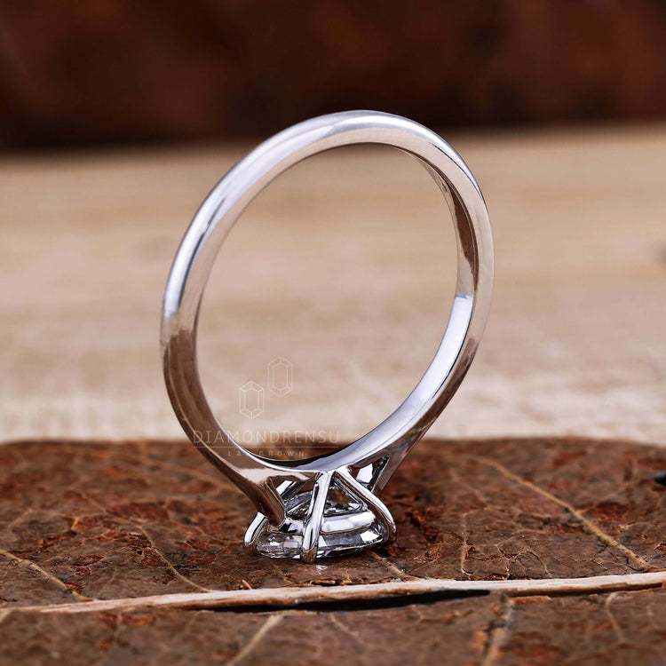 Pear shaped ring diamond crafted with a beautiful cathedral setting