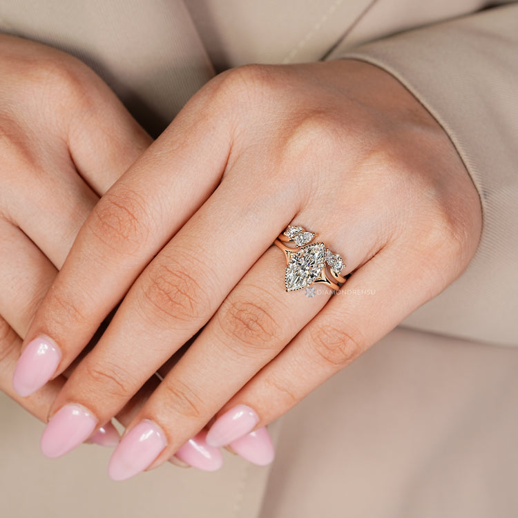 Solitaire bridal set with cathedral setting and milgrain details.
