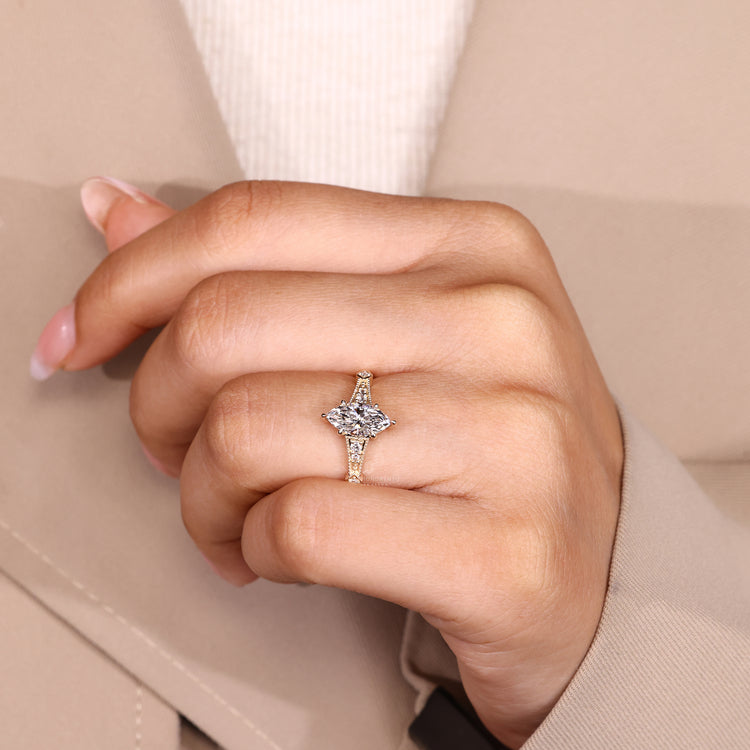 Handmade diamond ring with cathedral and prong setting.