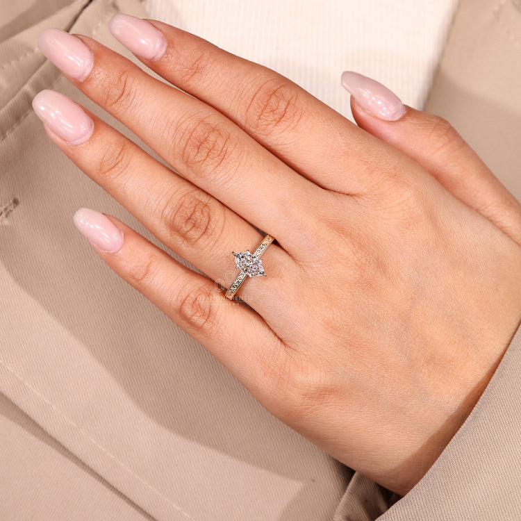 IGI certified marquise diamond ring with milgrain accents.