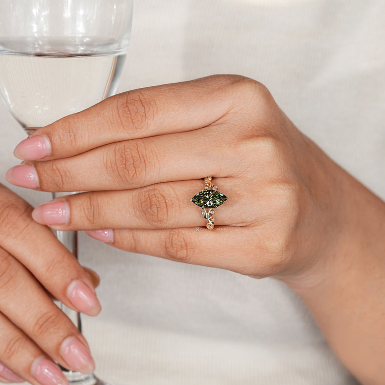 Handmade marquise ring with hidden round diamonds.