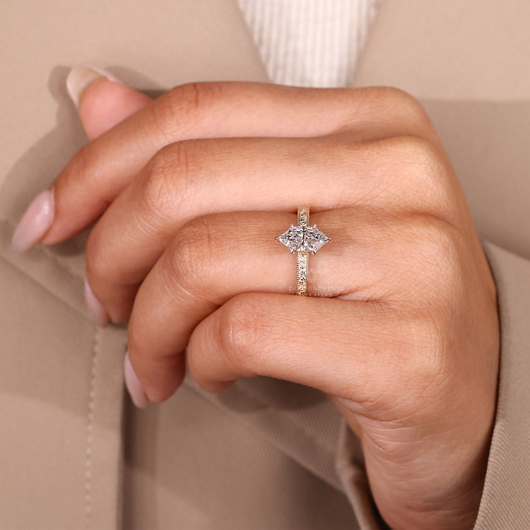 Marquise cut diamond ring with art deco design style.