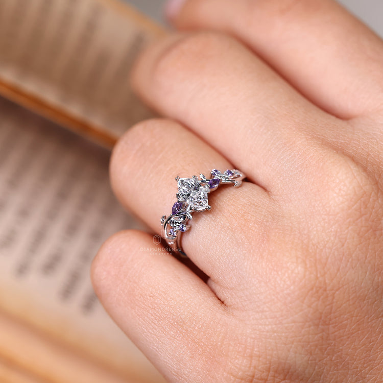 Dutch marquise diamond ring with leaf style prong.