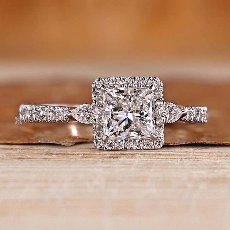 IGI certified princess diamond ring with tapered shank.