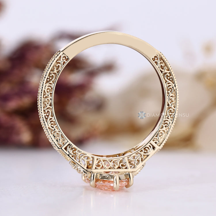 Handmade marquise diamond ring with round side stones.