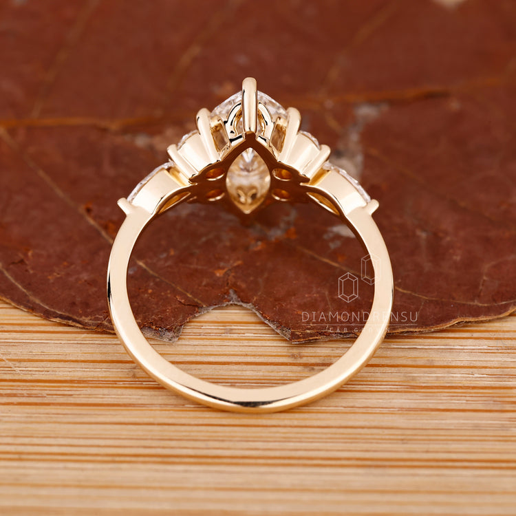 Marquise diamond ring with mixed round and marquise stones.