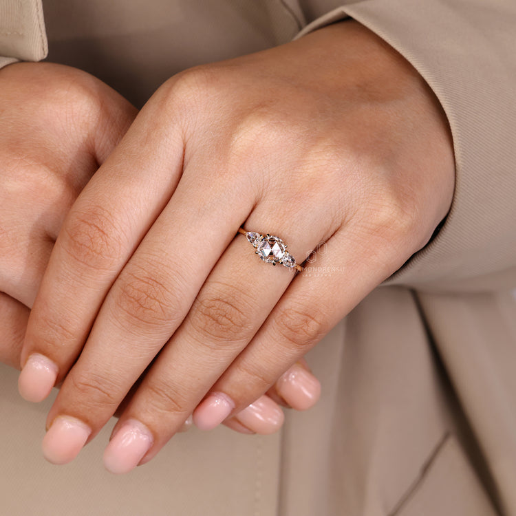 Handmade three stone diamond ring with open gallery setting.