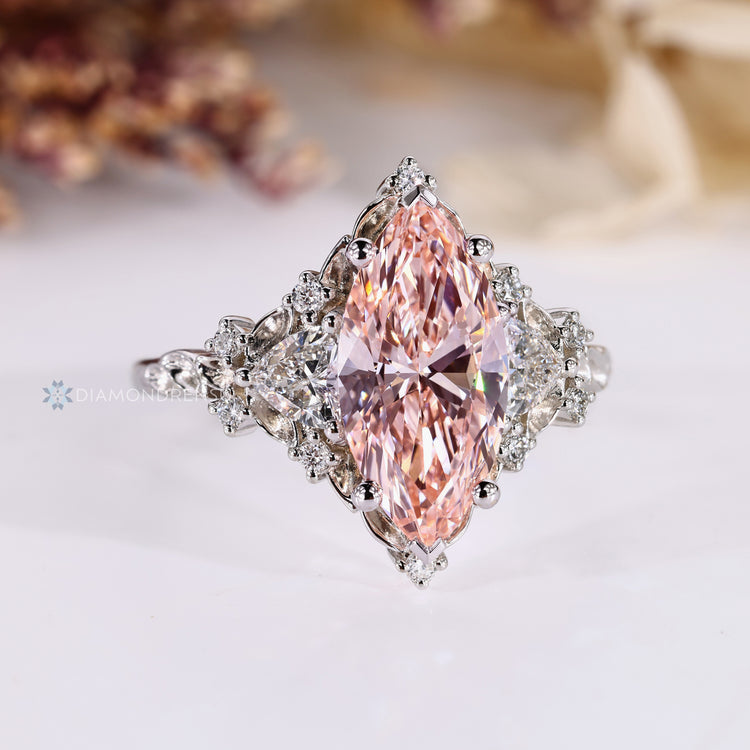 Marquise engagement ring with art deco cluster setting.