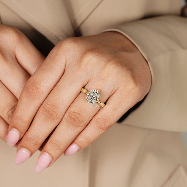 Handmade lab grown cushion diamond ring with side stones.