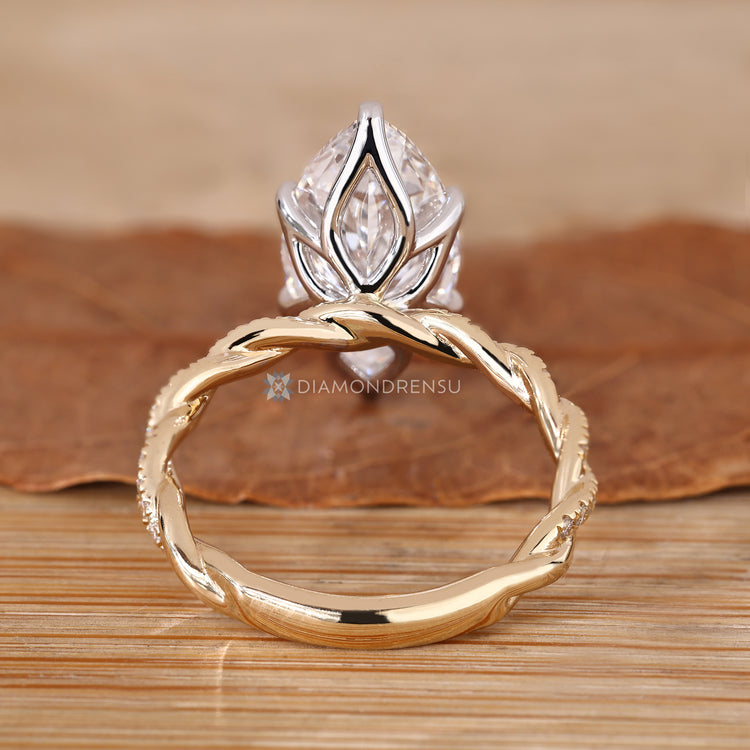 Handmade lab grown diamond ring with tulip setting.
