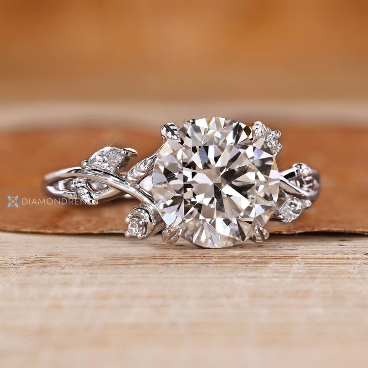 Lab grown diamond ring with marquise side stones.