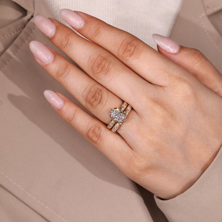 Stackable wedding band with marquise and round stones.