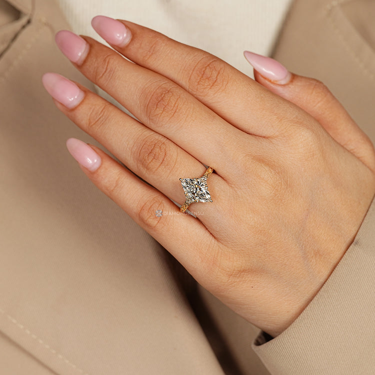 Lab grown diamond marquise ring with muse setting.