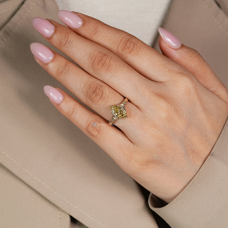 IGI certified Art Deco engagement ring with cathedral setting.