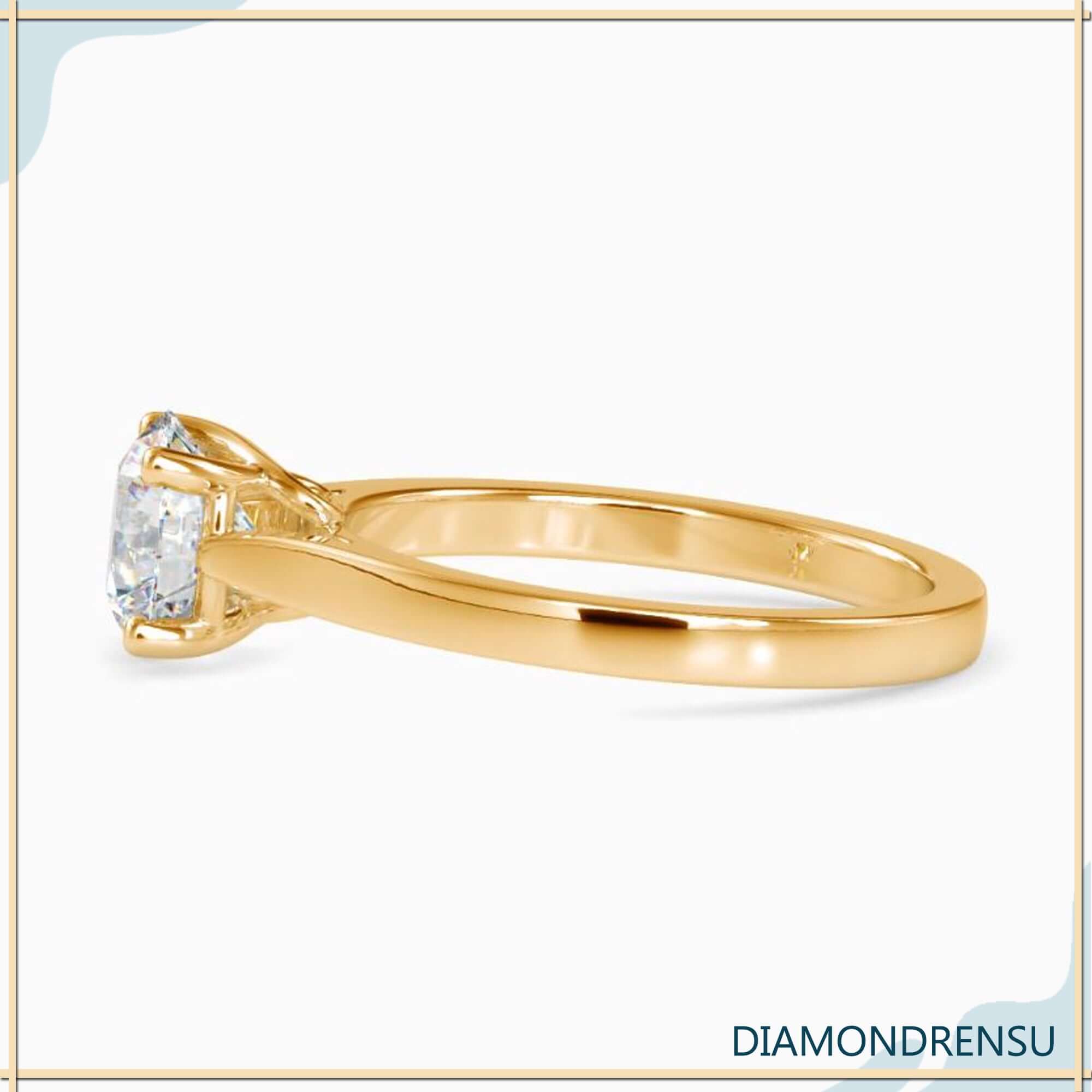 White gold diamond ring with solitaire round cut.