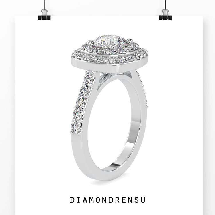 Buy engagement ring in UK with round diamond and pave band.