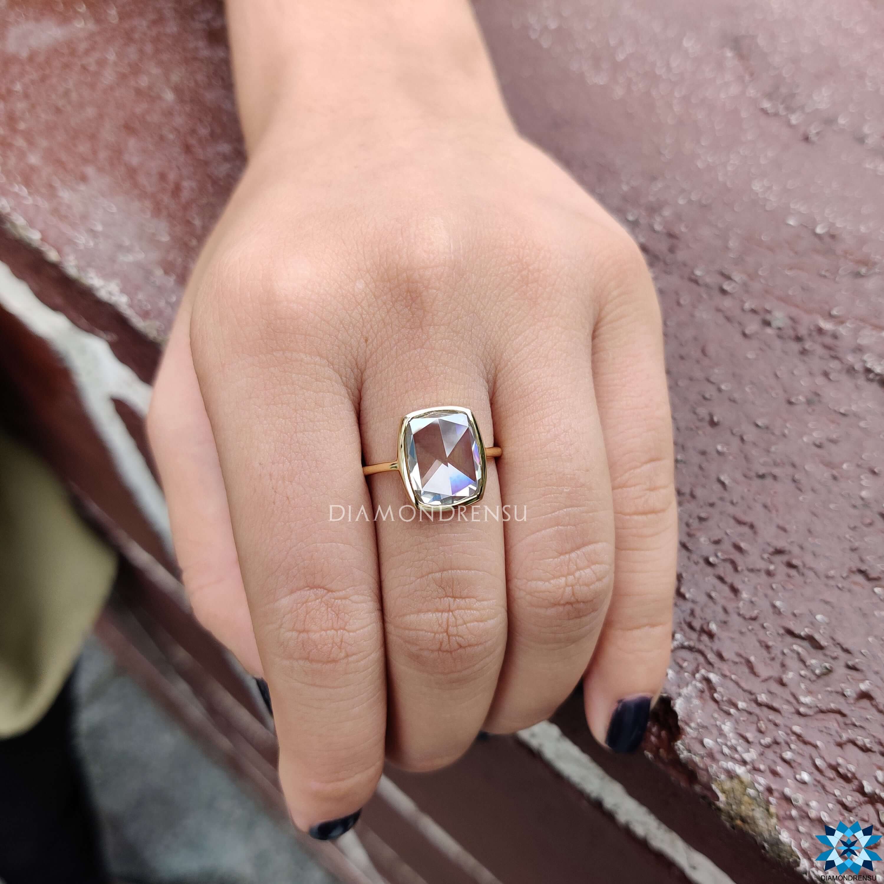 Diamondrensu UK bezel set cushion cut moissanite ring.