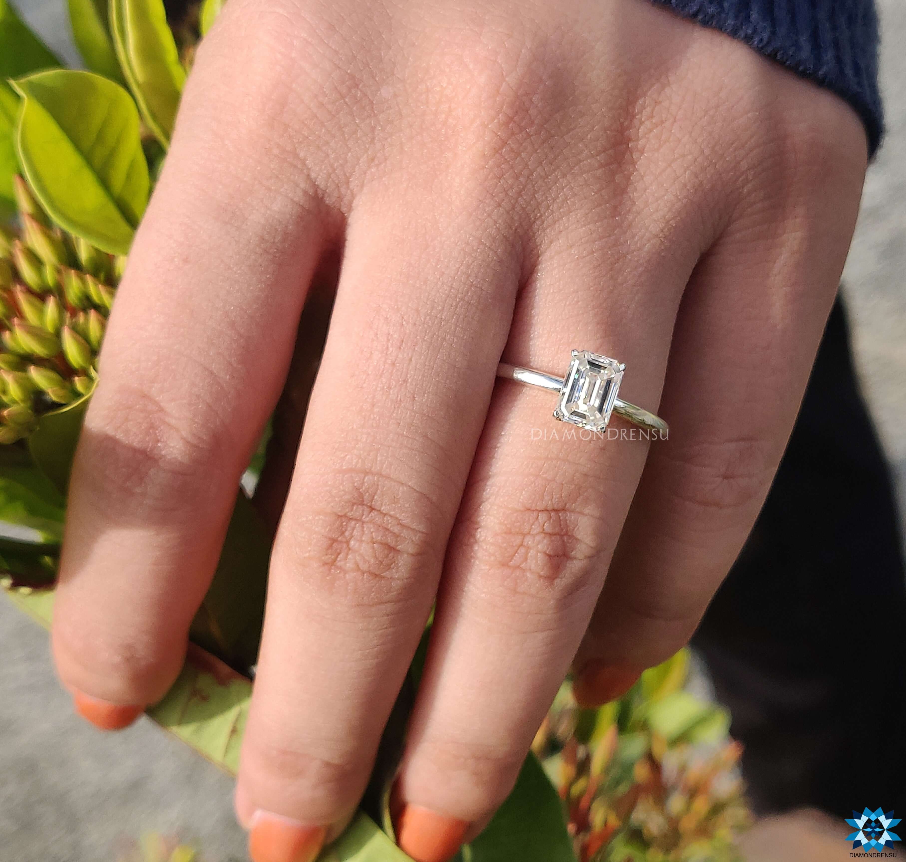 Stunning emerald cut moissanite ring set in a beautifully crafted band.