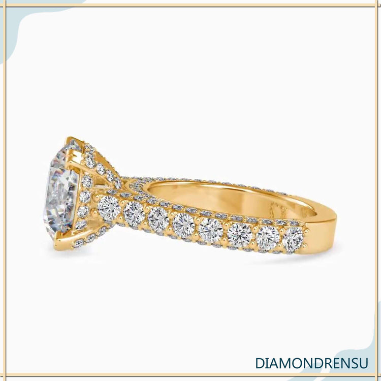 Rose gold engagement ring with cathedral and pave rows.