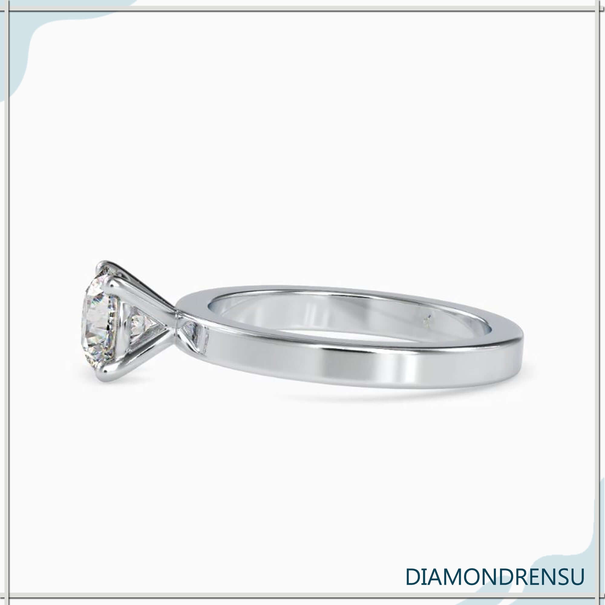 Diamondrensu UK ring with gold solitaire and 4 prong style.