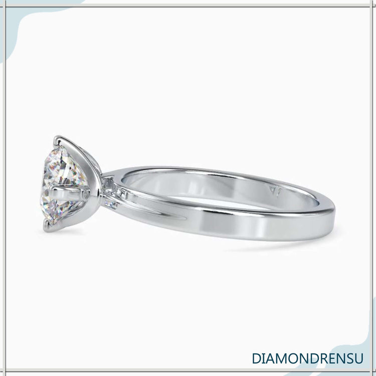 White gold diamond ring with antique-style solitaire.