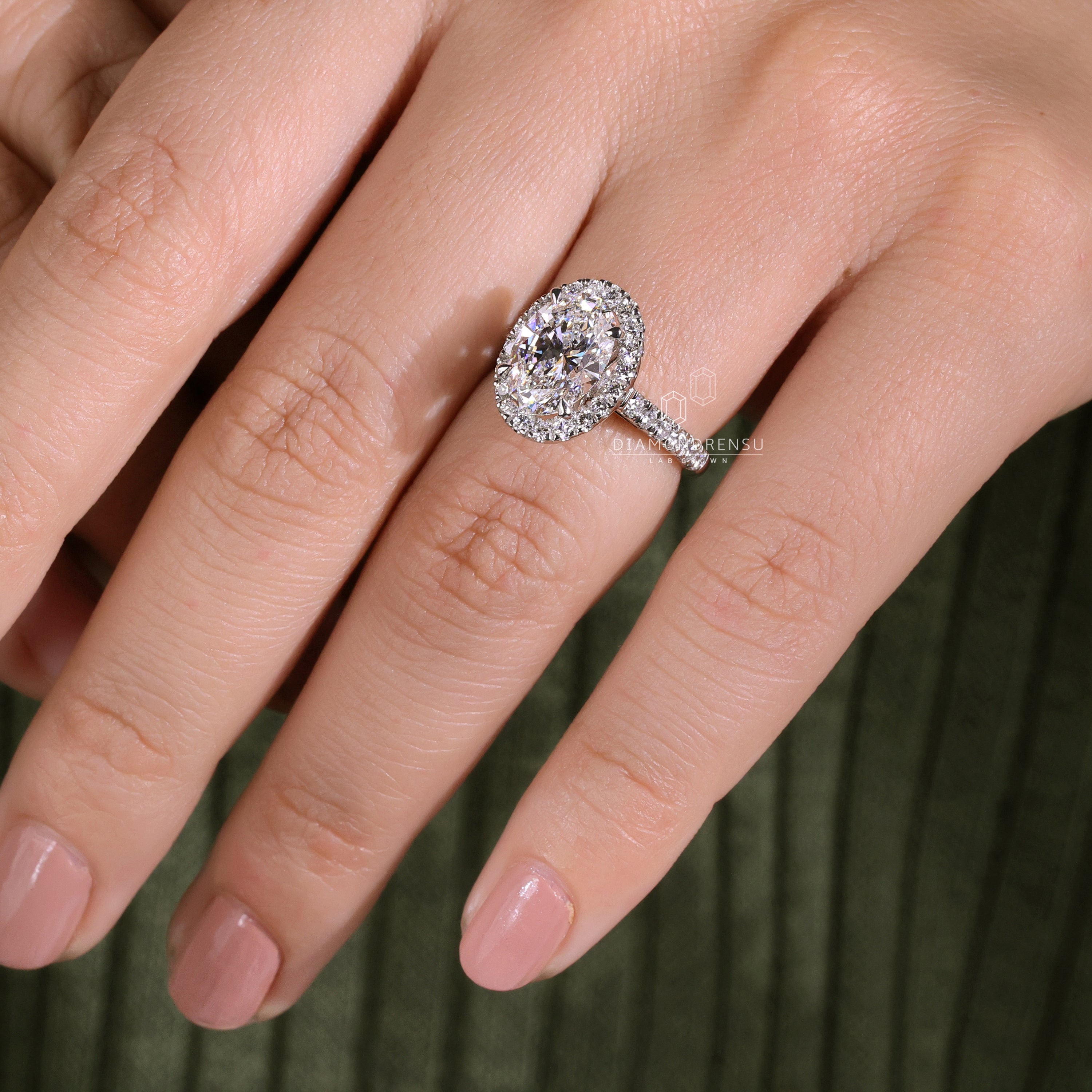 Stunning cathedral setting ring with lab grown diamond charm.