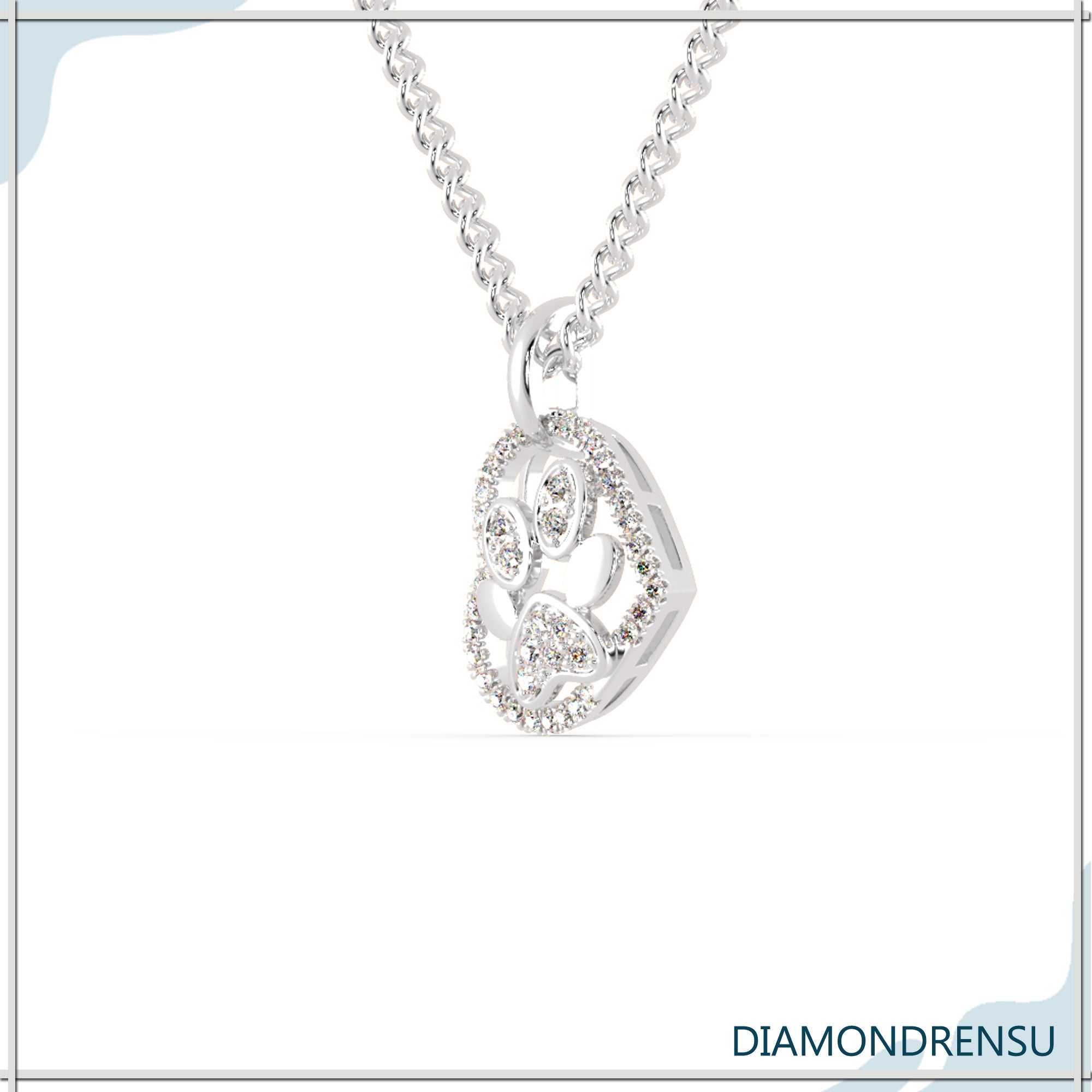 Round diamond pendant with delicate heart engraving.