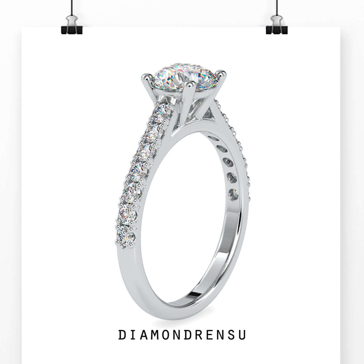 Round diamond pave band engagement ring in yellow gold.