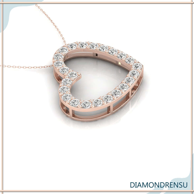 UK diamond pendant paired with matching gold heart pendant.