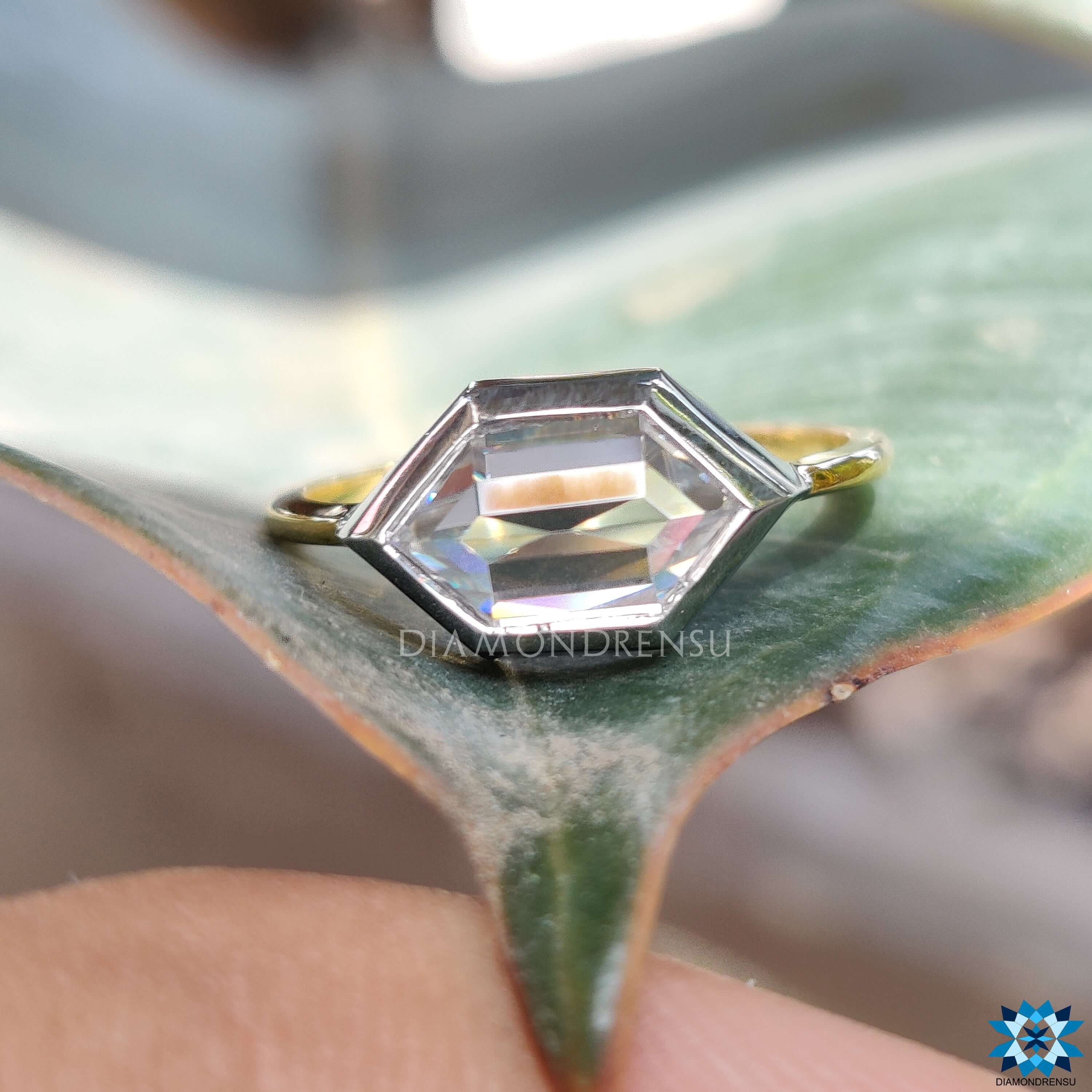 Handmade two-tone ring with hexagon rose cut moissanite.
