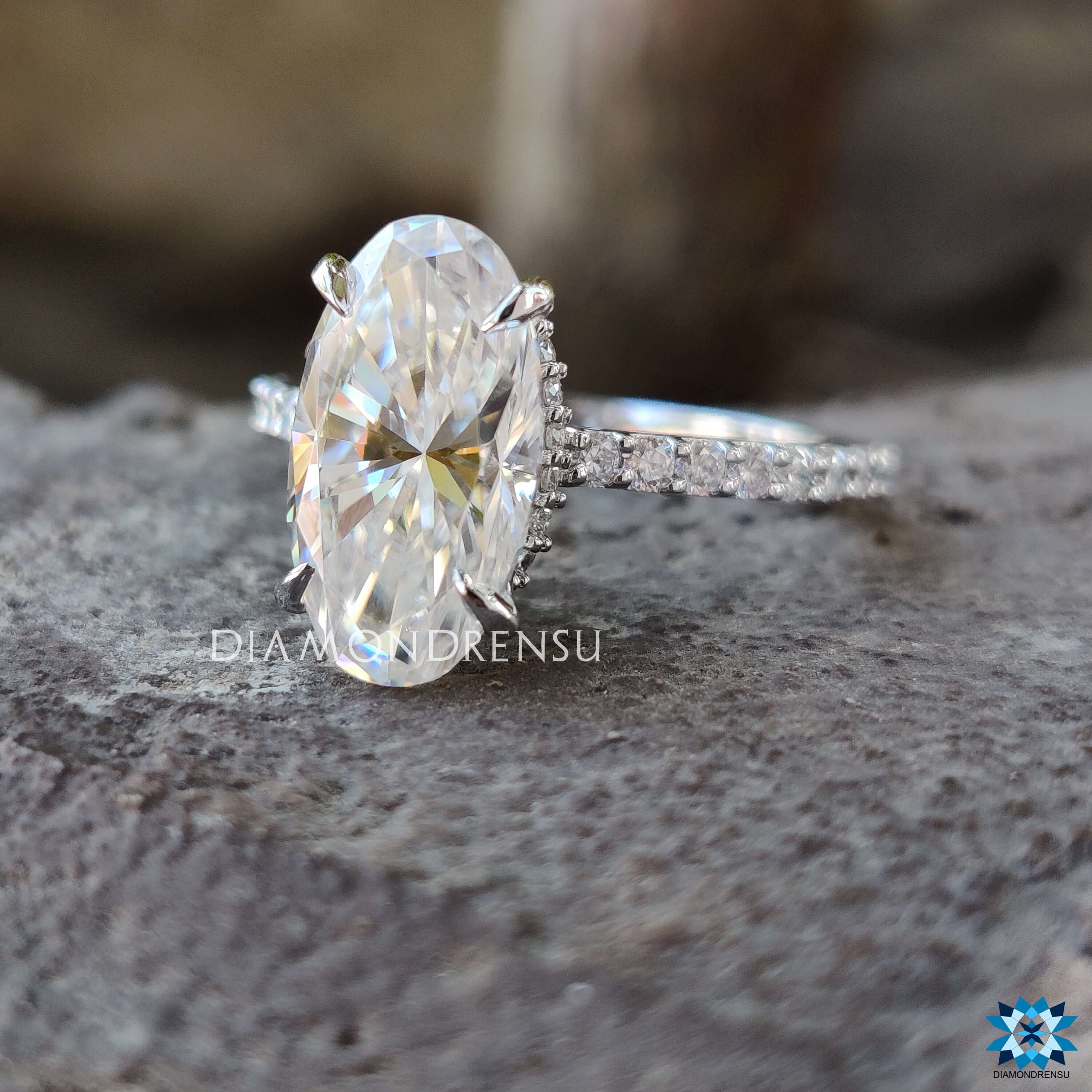 Claw prong setting on Moval cut moissanite ring.