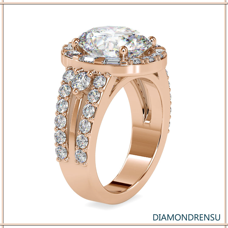 UK engagement ring with baguette halo and oval centre.
