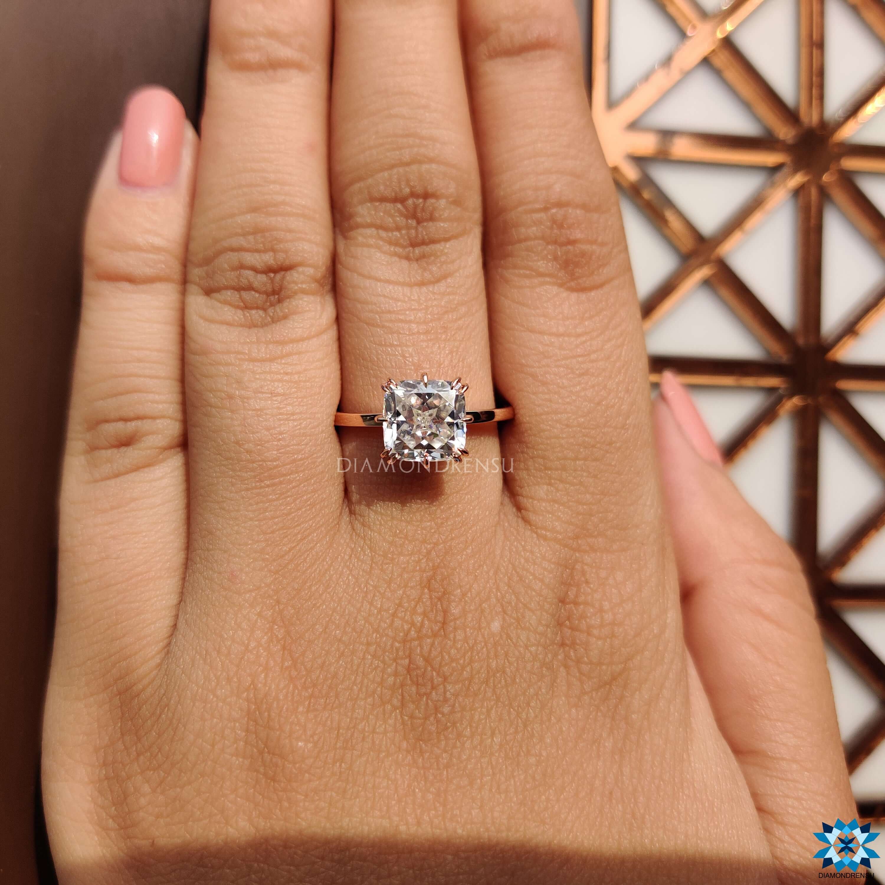 Diamondrensu UK ring with cushion Rensu moissanite.