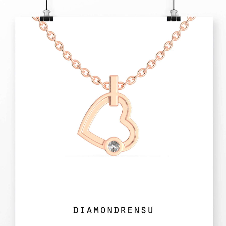 Lab grown round diamond pendant in artistic heart design.