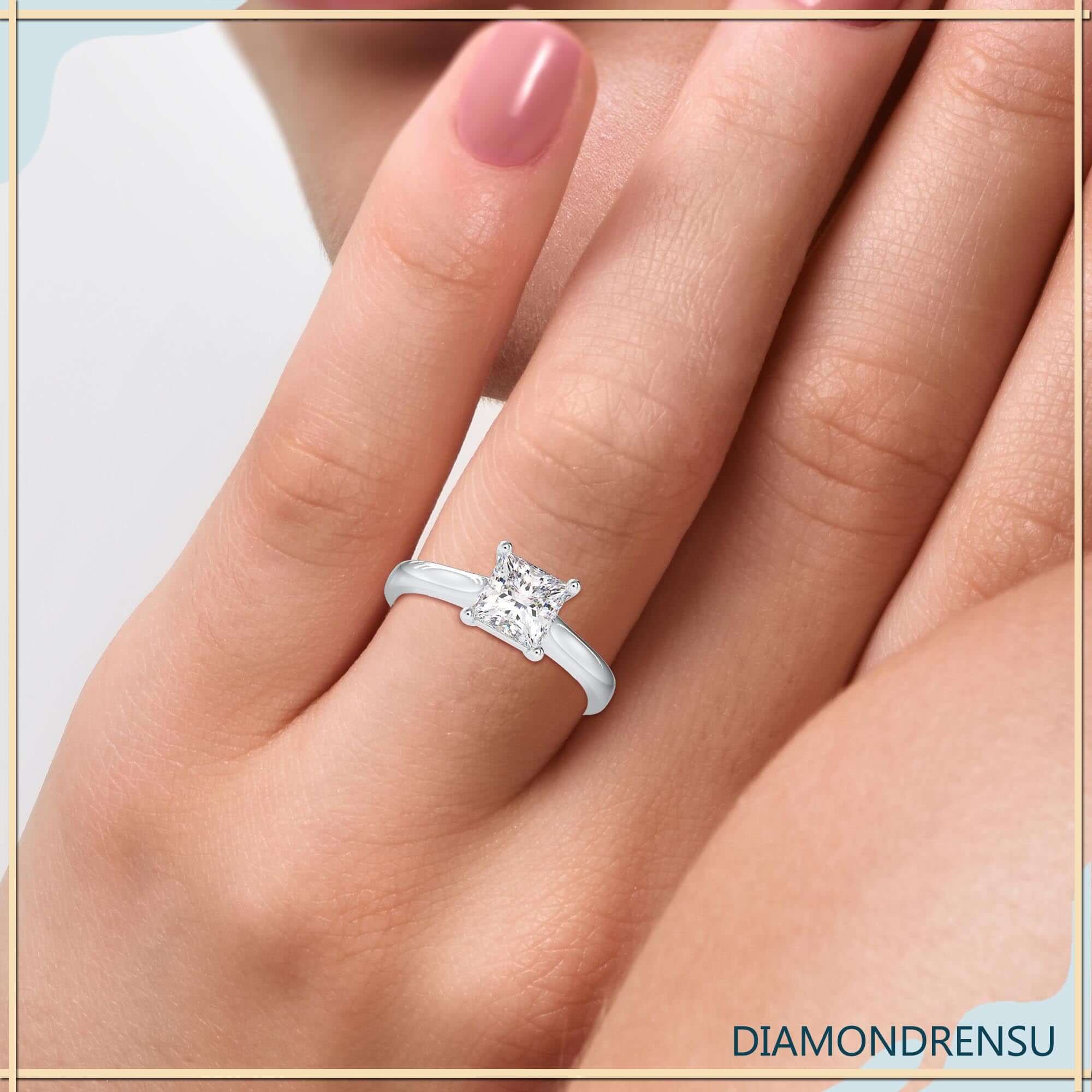 Lab grown diamond solitaire ring with princess cut in white gold.
