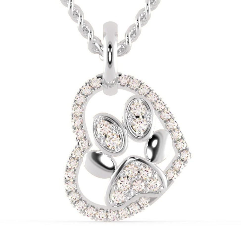 Heart on pendant crafted in white gold with round diamond.