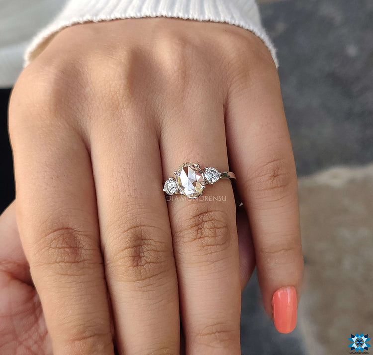 Oval shaped ring set in a beautiful vintage ring design for elegance.