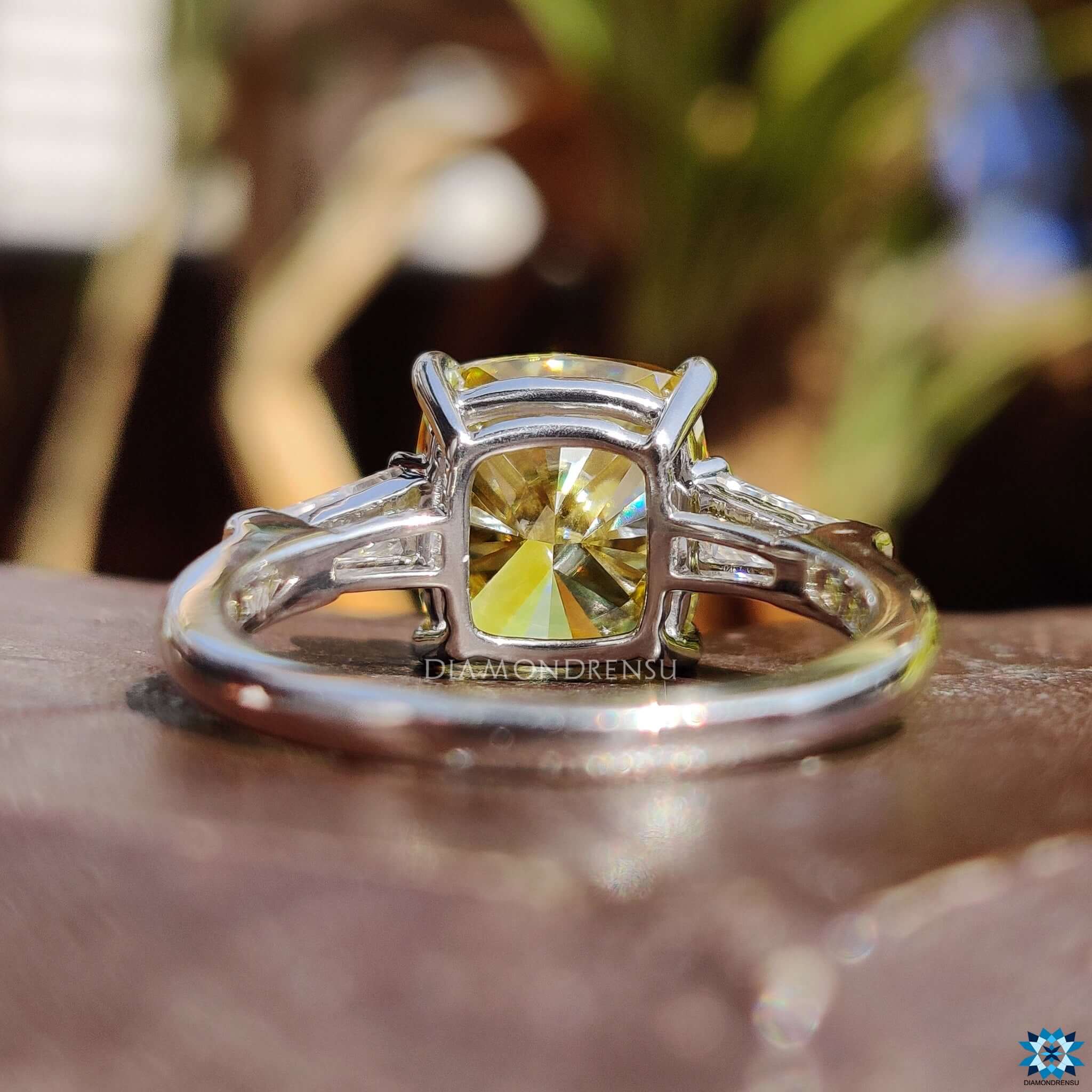 Handmade cushion cut engagement ring.