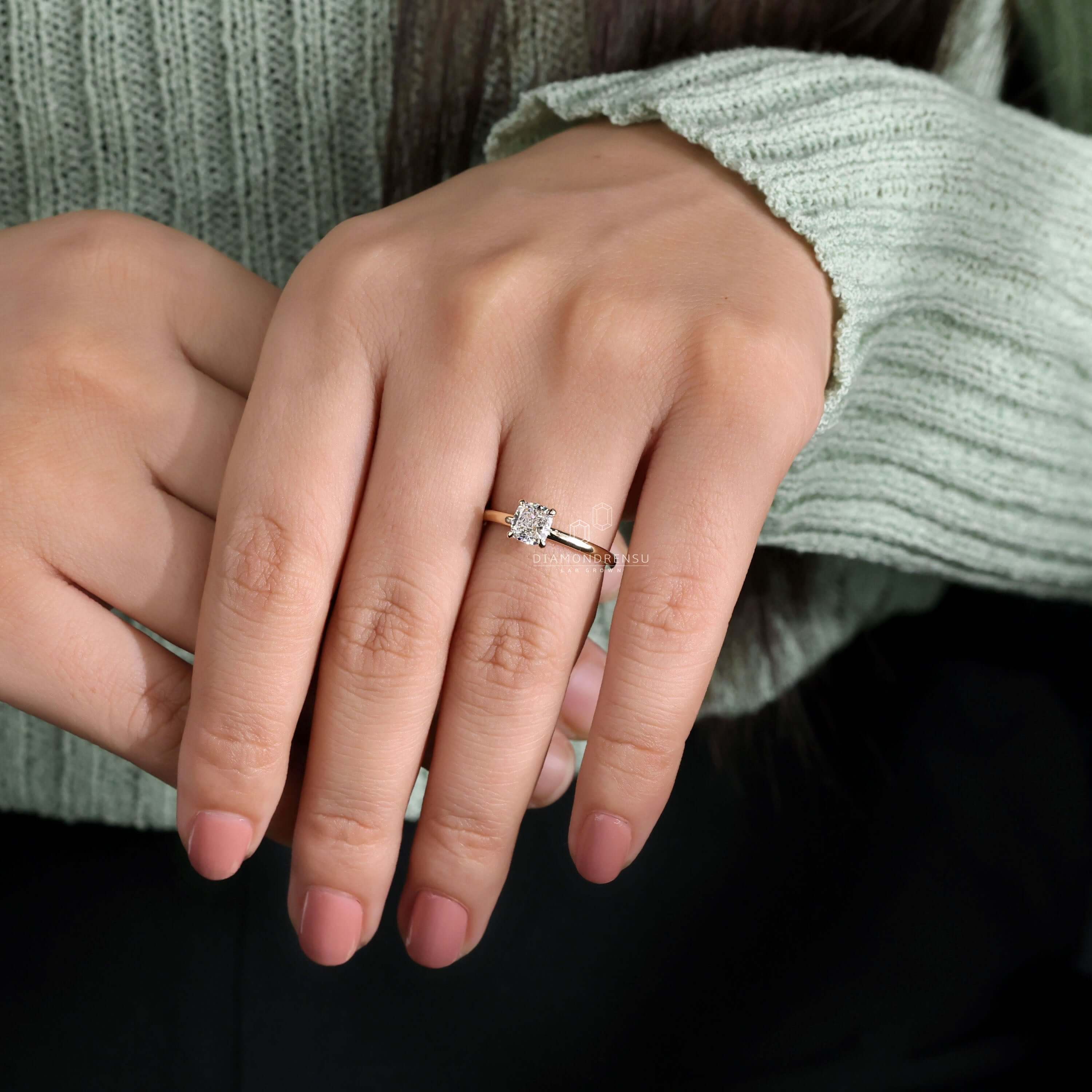 Gold diamond ring featuring a cushion cut engagement ring with an igi certified Lab Grown Diamond for modern brides.