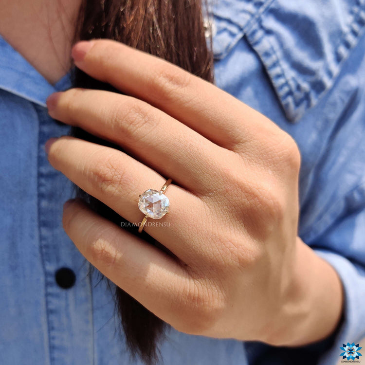 Rose cut moissanite solitaire ring with 4 prongs.