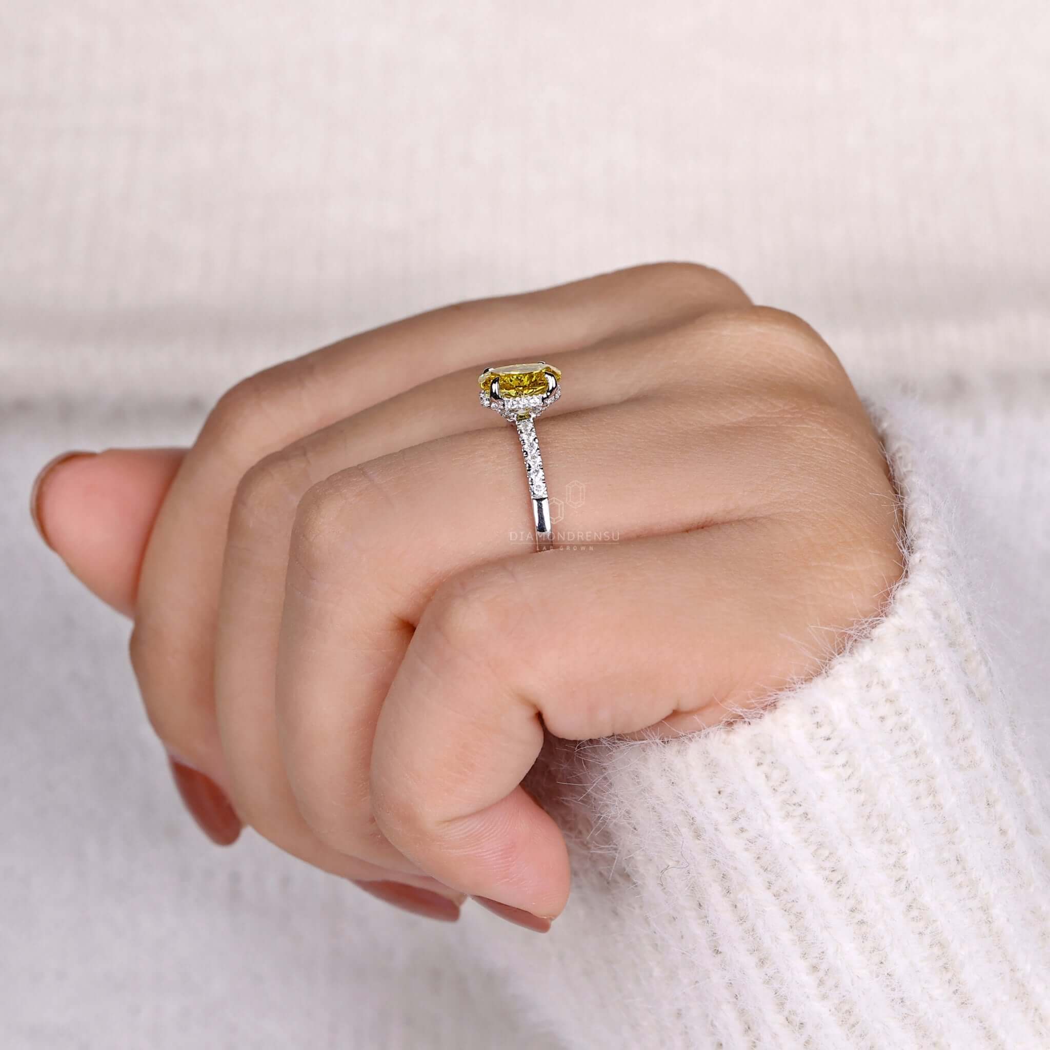 Hidden halo ring with a yellow diamond in an IGI certified design, perfect as a diamond ring UK favourite.