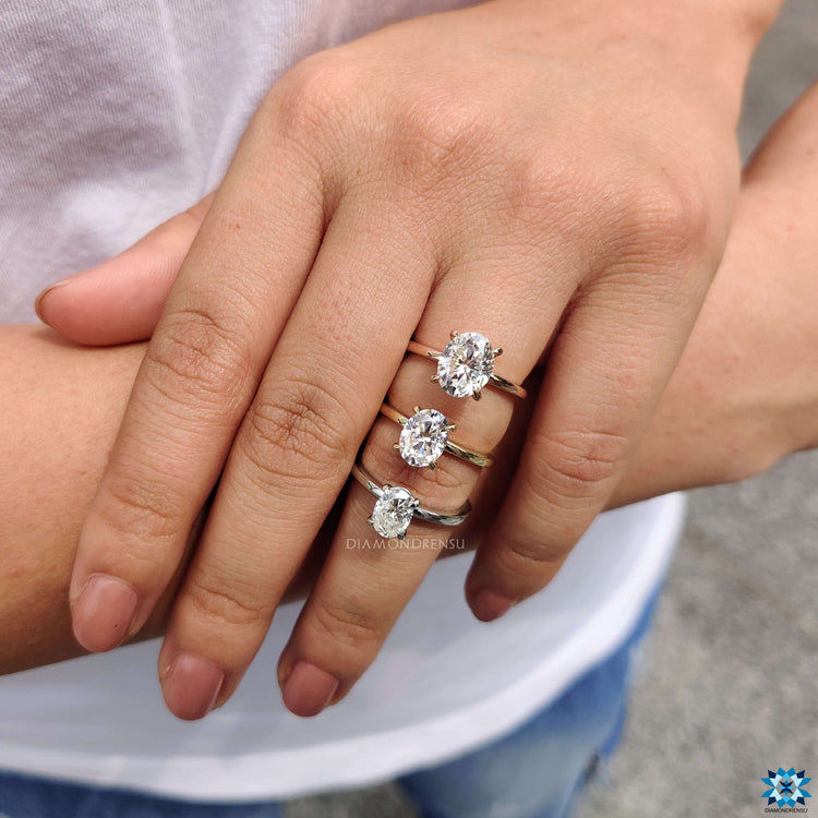 Custom engagement ring featuring oval moissanite.