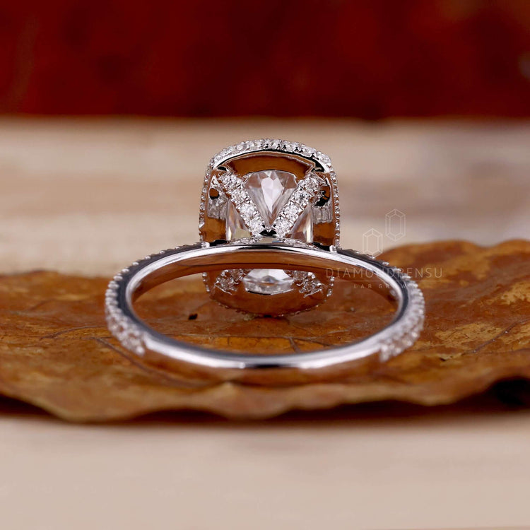 Cushion engagement ring with pave ring diamond accents in lab grown diamond design for eco-conscious buyers.